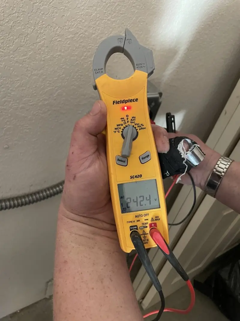 Voltage testing with clamp meter during Electrical Installation Services in Capitol Heights